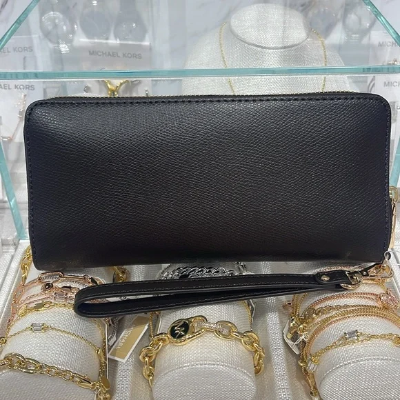 Michael Kors JST Lg Leather Continental Wallet Wristlet Phone Holder C
Chocolate - Picture 5 of 16